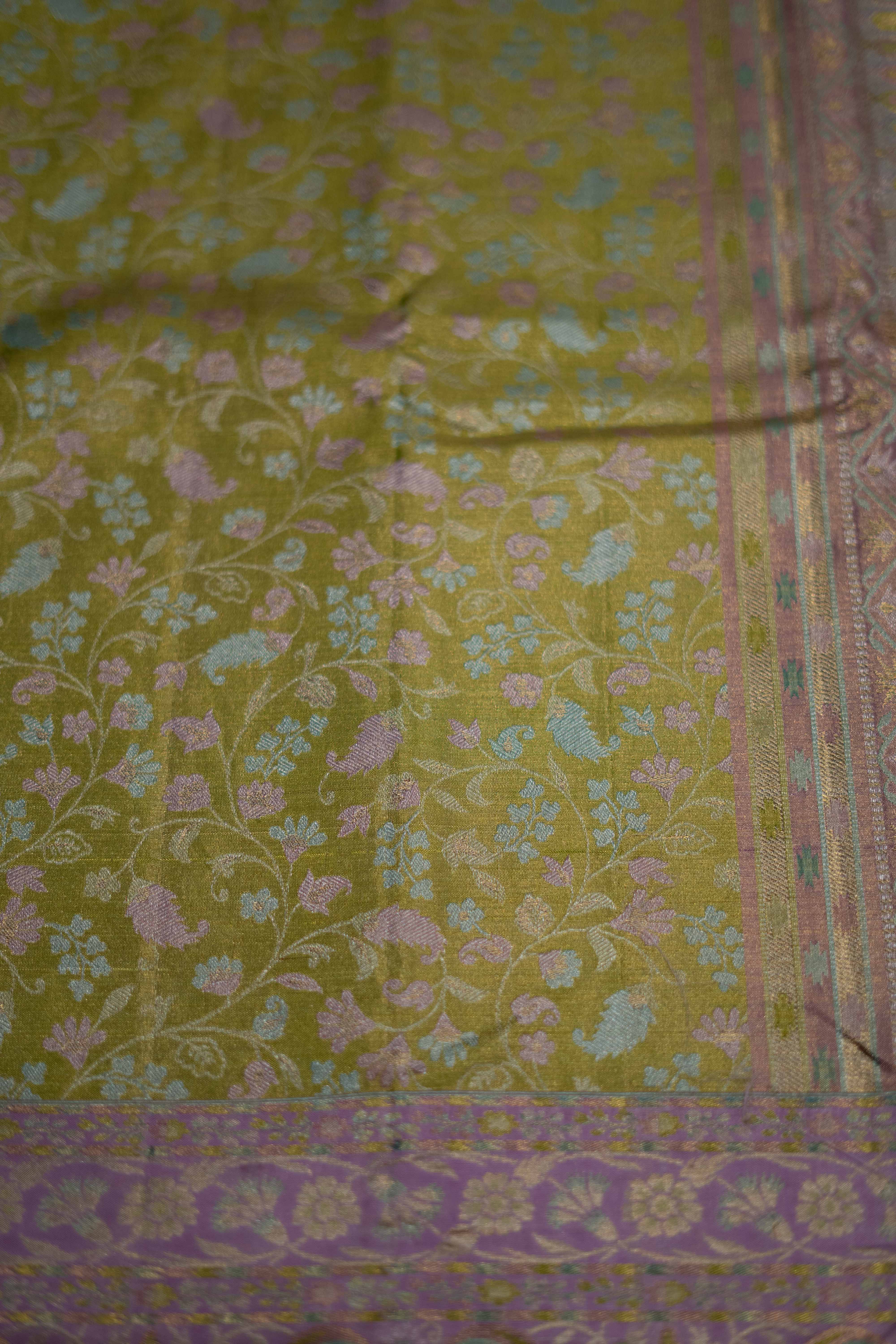 Green Kanchipuram Silk saree with Zari woven craftsmanship