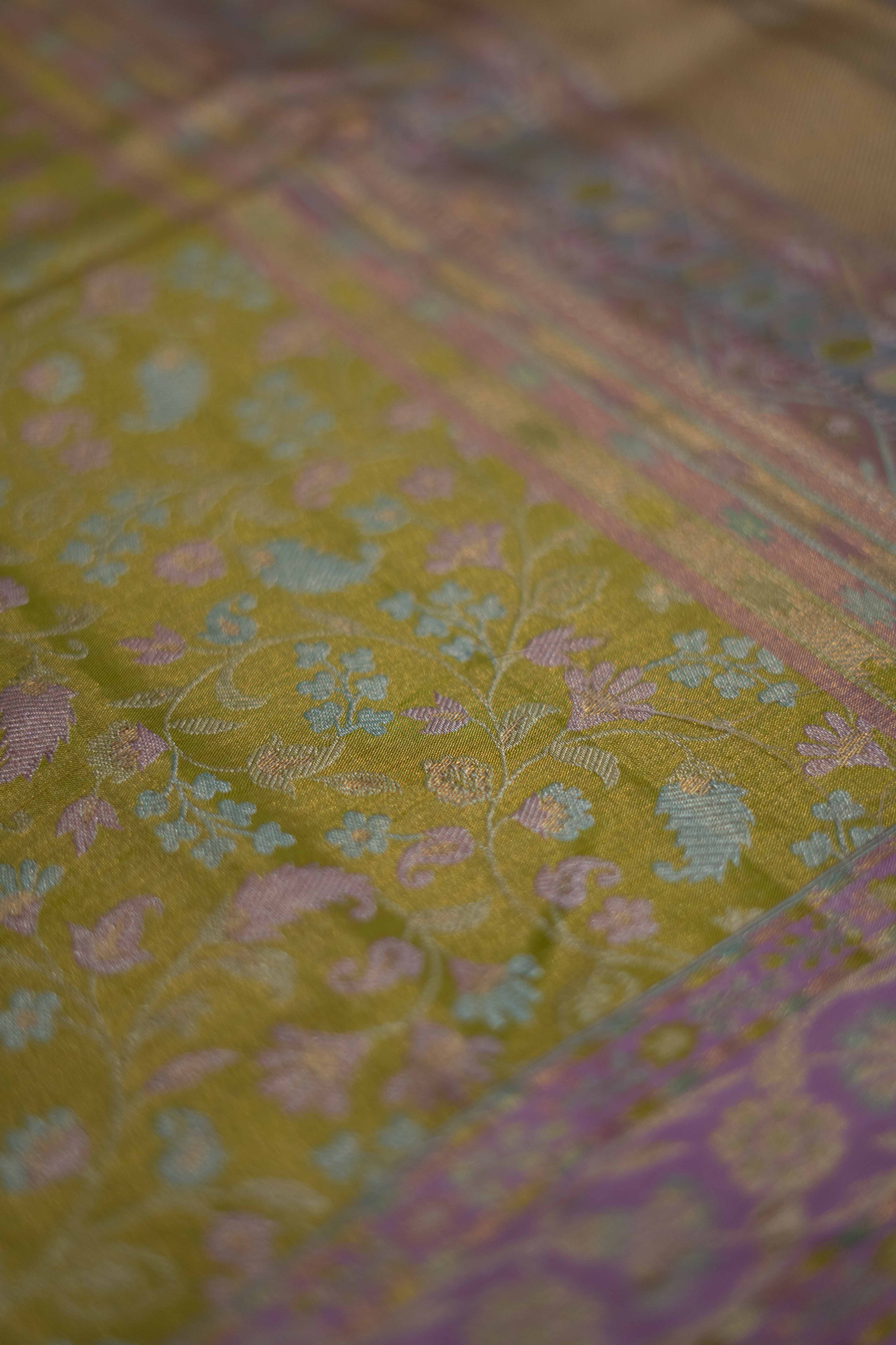 Green Kanchipuram Silk saree with Zari woven craftsmanship